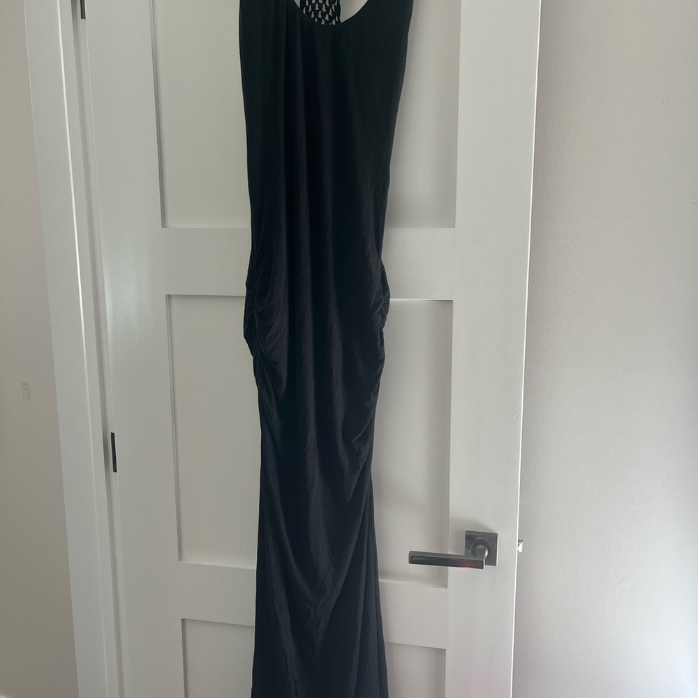 Black maxi dress with synch details, 2 side slits and crochet detail on the back